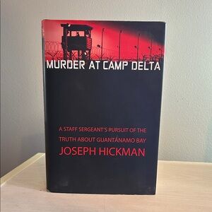 3/$10 Murder at Camp Delta Book